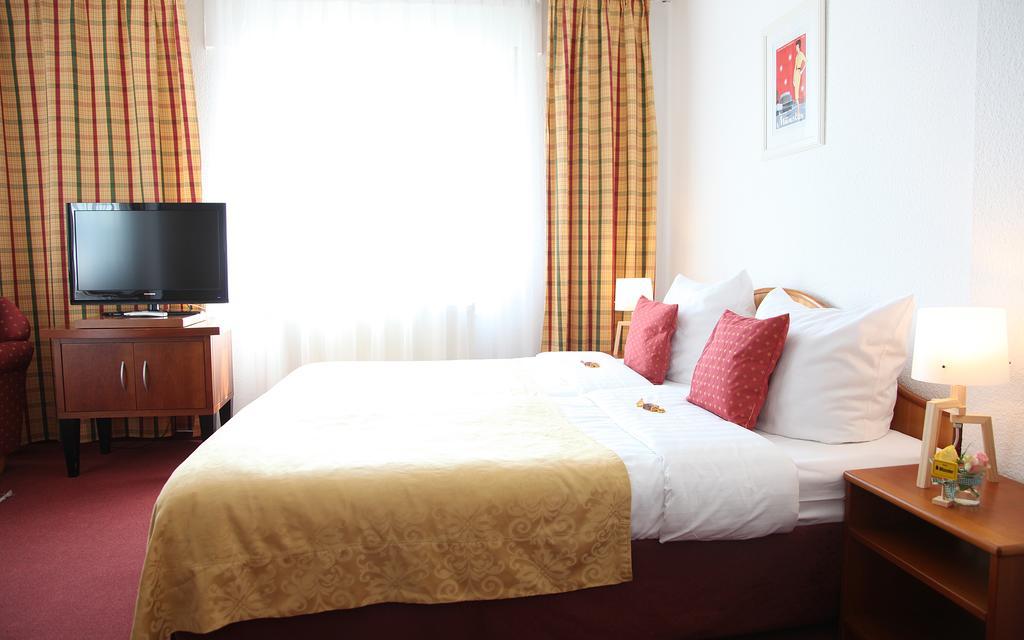 Cityhotel Amadeus Munster  Rum bild